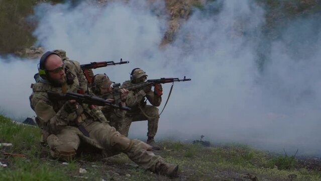 Ukrainian soldiers practicing shooting skills at the range