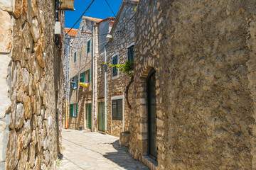 Romantic old street in historic town of Pakostane in Dalmatia, Croatia