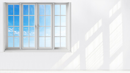 白い壁の空間に白いサッシの窓から見える青空