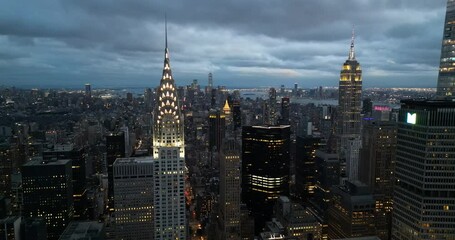 Aerial shot of Chrysler Building and Empire State Building at night, New York