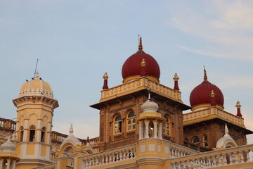 Fototapeta na wymiar A beautiful view of Mysore palace on the evening sky background which is shot on camera.