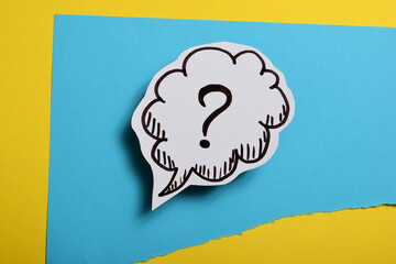 drawn question mark on a colored background