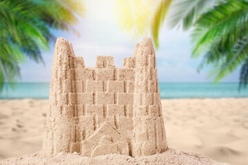 Sand castle on ocean beach, closeup. Outdoor play