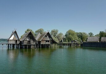 Fototapeta na wymiar Bronze Age houses on stilts at the short of Lake Bodensee in Germany