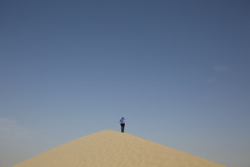 Fototapeta na wymiar The hot desert landscape of Dubai.