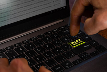 Obraz na płótnie Canvas person typing on a keyboard