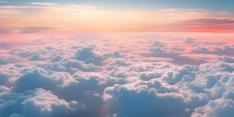 Beautiful pastel cloudscape. Fluffy clouds in the sky. Horizon from a plane. Weather and overcast dawn