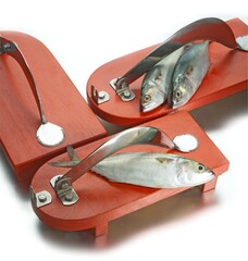 indian wooden chopping board with fresh fish