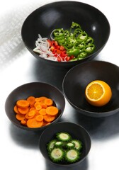 cast iron pan / bowl with fresh vegetables