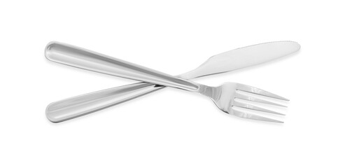 Knife and fork isolated on white, top view. Stylish shiny cutlery set