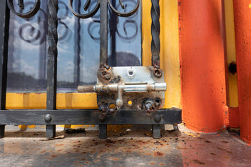 Lock on the lattice of the cottage window