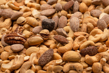 A group of almonds, pistachios, walnuts, macadamia, cashews.