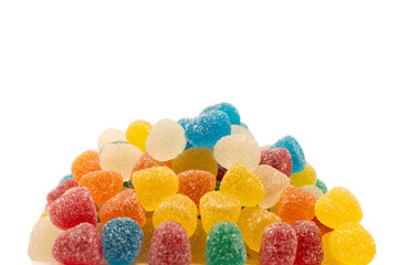 Assorted colorful gummy candies isolated on a white background.
