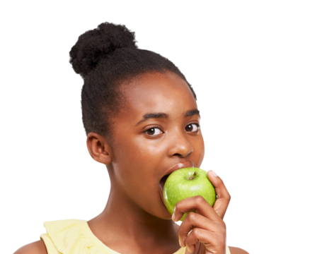 Apple, face and portrait of black girl eating healthy food isolated on a transparent PNG background. African female child, kid or teen biting organic fruit for health diet, fiber or natural nutrition