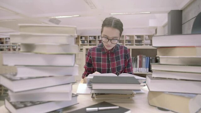 Student clap her hands, smiles and triumph raising her hands up.Now she is cheerful and positive person because she found her answer.