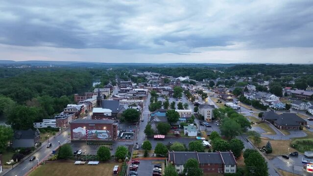 Downtown Milton, Pennsylvania with drone video moving up.