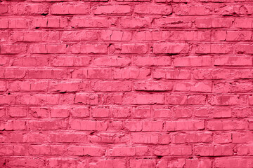 Brick wall toned in pink color for design background