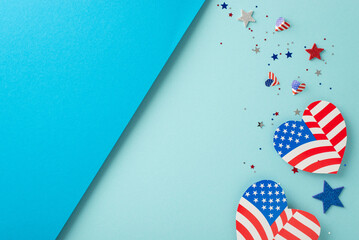 Fototapeta premium Constitution Day USA imaginative congrats. Top view of symbolic adornments: hearts featuring American flag design, glittering stars, shiny confetti on bicolor backdrop with vacant space for text or ad