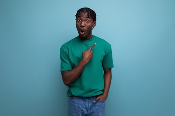 nimble smart american young man in a tank top on an isolated background