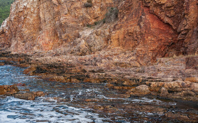 Nature background with wall of rock and sea water