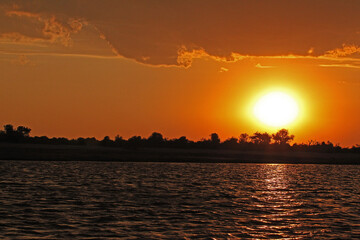Fototapeta na wymiar Sunset at Chobe River, Okavango Delta in Botswana