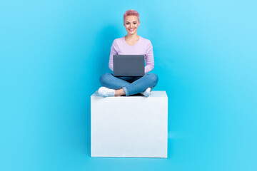 Full length photo of corporate worker girl programmer office manager sitting dormitory white box...