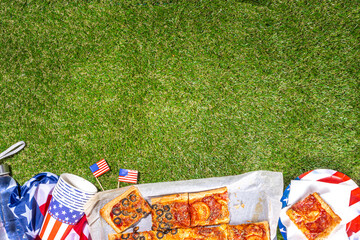 july 4th holiday party pizza, Fourth of July, Patriotic Independence day festive and picnic food. Pepperoni, tomato and black olive pizza with lot of mozzarella, in form of American flag