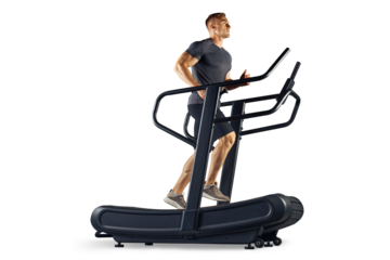 Full length of a fitness sporty man running or walking on a treadmill PNG transparent photo. Young male athlete in sportswear running on a professional treadmill in gym