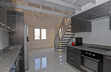 Modern kitchen in a luxury duplex apartment