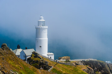 Sea Fret over Start Point Lighthouse, Trinity House and South West Coast Path, Devon, England