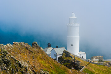Sea Fret over Start Point Lighthouse, Trinity House and South West Coast Path, Devon, England
