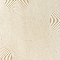 Top view pattern in Japanese Zen Garden with close up concentric circles on sand for meditation and...