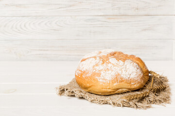 Homemade natural breads. Different kinds of fresh bread as background, perspective view with copy space