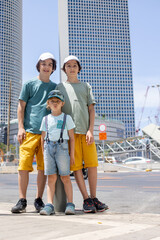 Mother and child, family enjoying the seaside views in Tel Aviv on a hot summer day