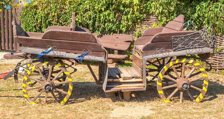 An old wooden cart in the village yard