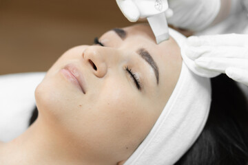 Maintaining skin health: skin care as an important component of overall health. Ultrasonic facial...