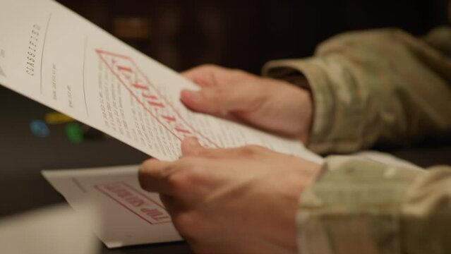 Soldier is Reading Classified Document