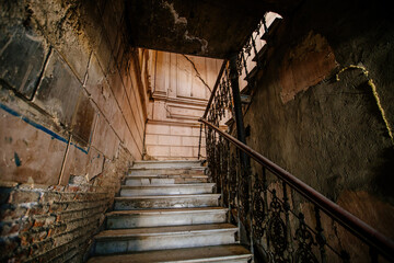 Old stairs in old abandoned house in Tbilisi