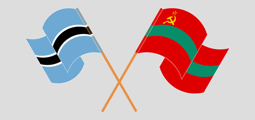 Crossed and waving flags of Botswana and Transnistria