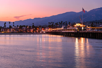 View of Stearns Wharf in Santa Barbara, California, at dusk in autumn