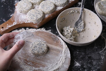 photo process of making a product of cottage cheese and poppy seeds