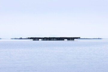 Obraz premium Rafts for seafood in a sea estuary 