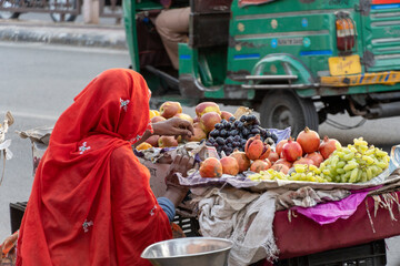 Jaipur, India. march 27 2023 woman sells vegetables in the street