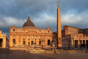 Fototapeta na wymiar Vatican City, Rome, Italy. Cityscape image of illuminated Saint Peter's Basilica and St. Peter's Square, Vatican City, Rome, Italy at sunrise.