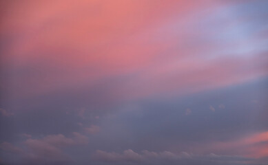 Fototapeta na wymiar Beautiful bright summer sunset sky with clouds. Sunset sky background.