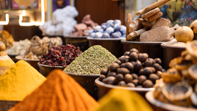 United Arab Emirates, Dubai district Deira, spice market, April 2023. Old traditional souk for spices and herbs. Curry, masala, pepper, dried blossoms, paprika, saffron, red pepper, mint, kind teas.