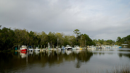 Boats in a small marina in Ocean Springs, MS