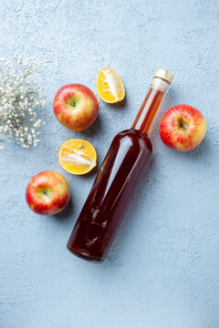 top view apple vinegar in bottle on white background juice fruit color photo red fresh sour food