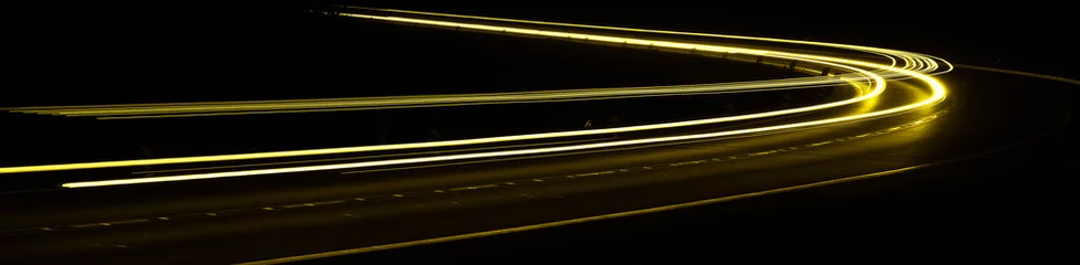 Cercles muraux Autoroute dans la nuit yellow car lights at night. long exposure