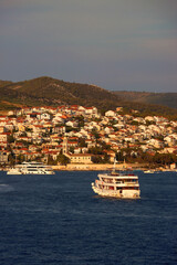 Small picturesque town Hvar on island Hvar, Croatia, illuminated by warm sunset light.